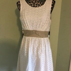 White eyelet mini. Size L fits size 8